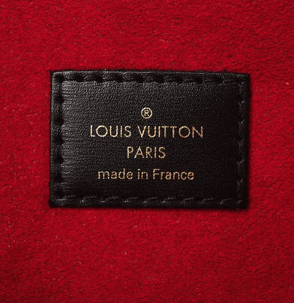 Borsa Pochette Metis in tela Monogram con manico intrecciato